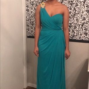 Seafoam green formal gown with gold broach